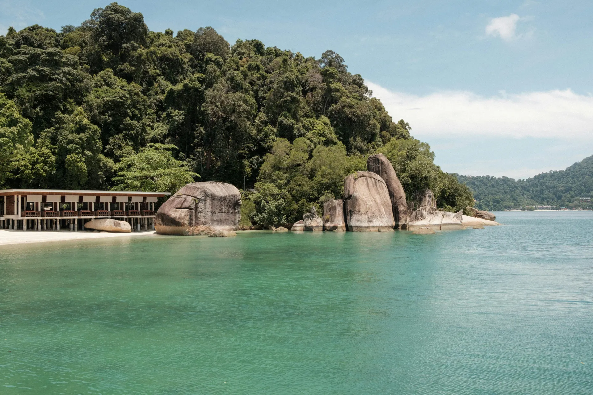 Editorial Malaysia travel portrait with soft resort styling and tropical light